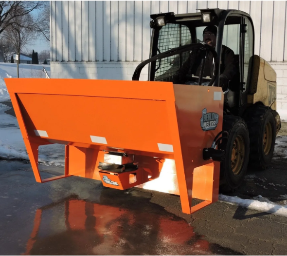 wheeled skid steer with salt spreader