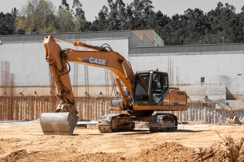 Case excavator in construction site